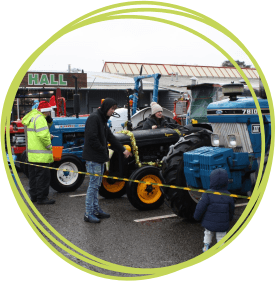 Tractors on display at the market